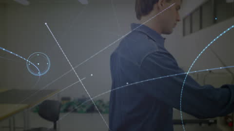 Worker Holding Wind Turbine with Digital Network Overlay