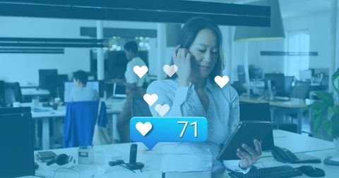 Professional Businesswoman Engaging with Social Media Notifications - Download Free Stock Images Pikwizard.com