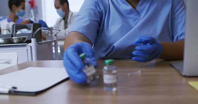 Healthcare Professional Preparing Vaccine Doses in Medical Office - Download Free Stock Images Pikwizard.com