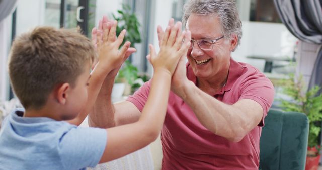 Grandfather and Grandson Playing Together at Home - Download Free Stock Images Pikwizard.com