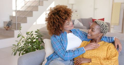 Loving African American Lesbian Couple Relaxing at Home - Download Free Stock Images Pikwizard.com
