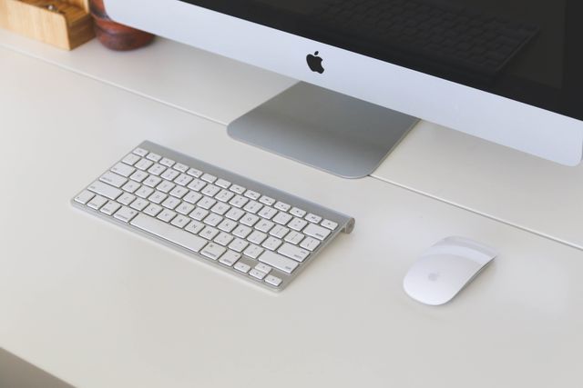 Modern Apple iMac with Keyboard and Mouse on Minimalist Desk - Download Free Stock Photos Pikwizard.com