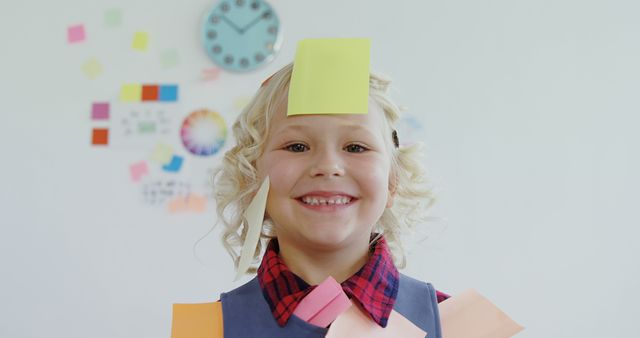 Happy Child Covered in Colorful Sticky Notes in Classroom - Download Free Stock Images Pikwizard.com