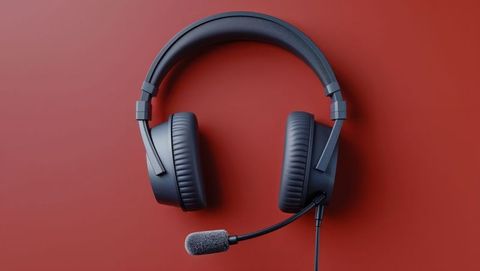 Black Wired Gaming Headset with Boom Mic on Red Background