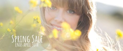 Joyful Woman Amidst Blossoms Heralding Spring Sale