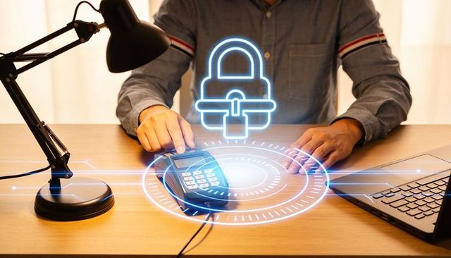 Merchant tapping contactless terminal displaying holographic padlock securing payments