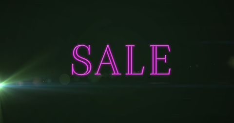 Neon Pink Sale Sign on Dark Background