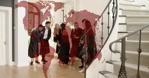 Graduates Celebrating in Home Foyer with Red Digital World Map Overlay