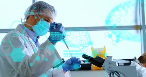 Scientist Analyzing DNA Data with Virtual Interface in Laboratory - Download Free Stock Images Pikwizard.com