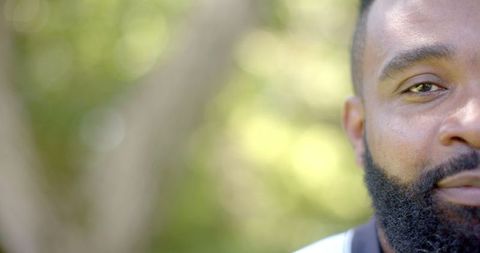 Partial Close-up of Smiling Bearded African American Man Outdoors