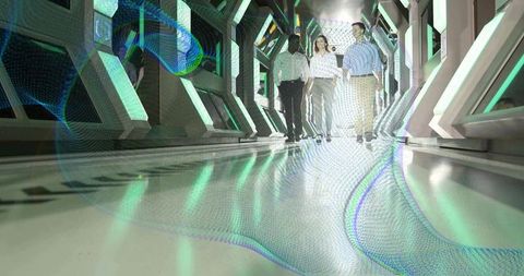 Futuristic corridor professionals walking toward camera with holographic floor reflections