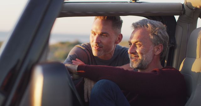 Happy Men Enjoying Road Trip in Convertible Jeep - Download Free Stock Images Pikwizard.com