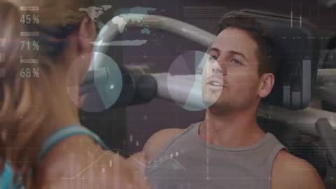 Trainer Coaching Client with Fitness Tech Display