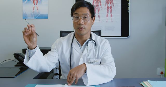 Doctor Explaining Diagnosis to Patient in Office - Download Free Stock Images Pikwizard.com