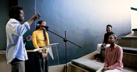 Team Presentation with Engaged Audience in Modern Meeting Room