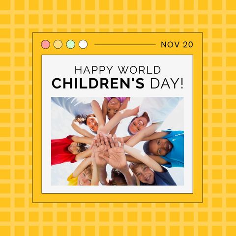 Diverse children smiling and stacking hands for children's day celebration