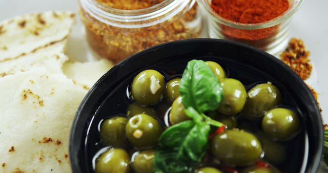 Marinated Green Olives with Herbs and Spices in Bowl - Download Free Stock Images Pikwizard.com