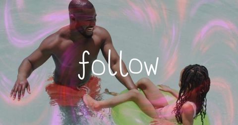 Father and Daughter Exhilarating in Shallow Water Fun