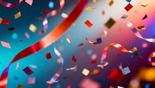 Colorful metallic confetti floating with curling ribbons against teal magenta bokeh