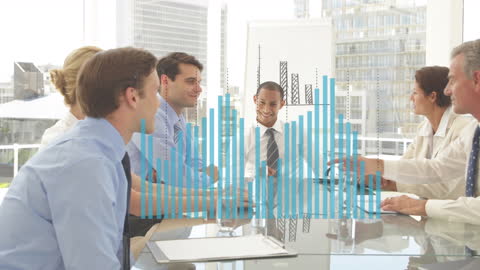 Diverse Business Team Analyzing Market Data in Office