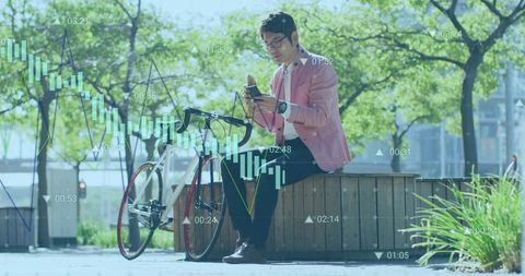 Asian professional checking stock charts on smartphone beside bicycle in sunny plaza