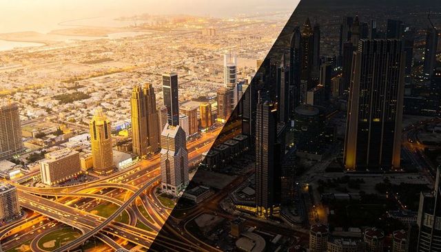 Day-night split aerial of coastal metropolis with glowing multilevel highway interchange