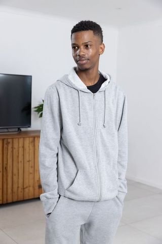 Casual Relaxed African American Man in Modern Living Room