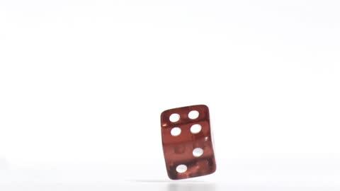 Animated Red Shapes Hovering over Spinning Dice