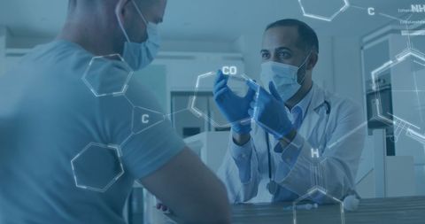 Doctor holding vaccine with chemical structures overlay