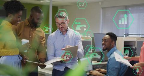 Business team presenting tablet with green AR sustainability overlays in modern office