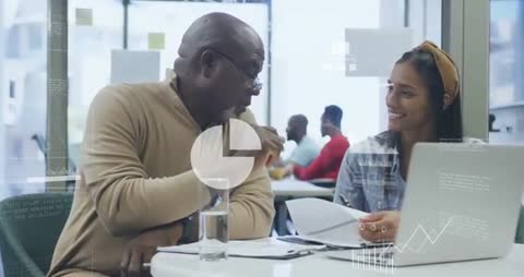 Business Mentor Explaining Data Analysis to Entrepreneur