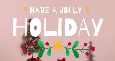 Pastel holiday flatlay with large white holiday text, green sprig and mini pine trees