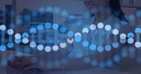 Asian woman typing with dna helix overlay, genomics biotech research, data visualization