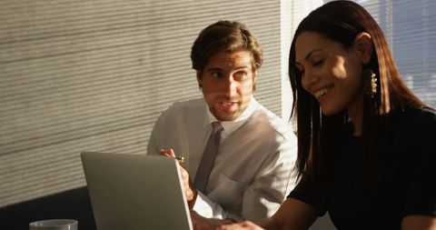 Colleagues Collaborating in Bright Modern Office Enviroment