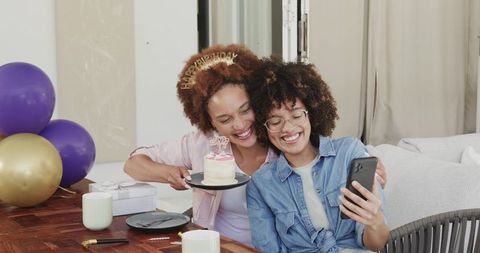 African American Friends Celebrating Birthday Taking Selfie with Cake, Balloons, Gifts