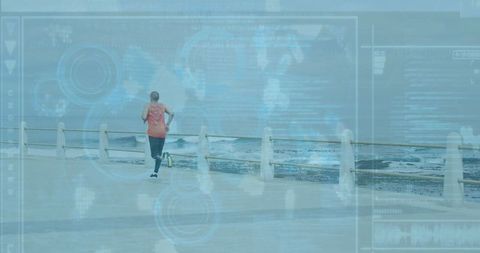 Runner with futuristic hud overlay by seaside