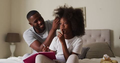 Father Tying Daughter's Hair at Home for Bonding Moment - Download Free Stock Images Pikwizard.com