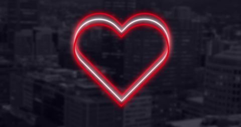 Neon Heart Glow Above Cityscape Symbolizing Love and Romance - Download Free Stock Images Pikwizard.com