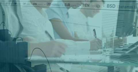 Business Team with Financial Charts Collaborating at Modern Office