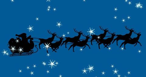 Santa's Sleigh with Reindeer Silhouette Amidst Falling Snowflakes