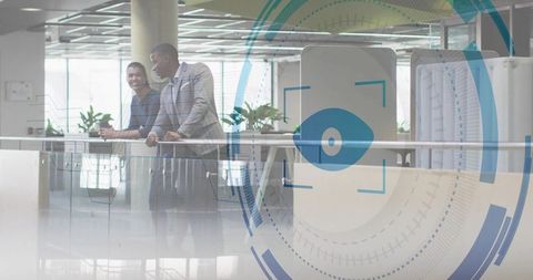 Colleagues Discussing New Ideas in Modern Office with Tech Overlay