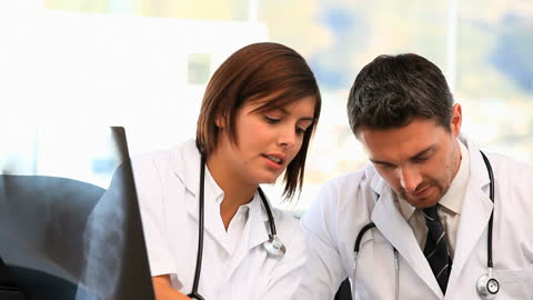 Medical Team Collaborating in Hospital Setting