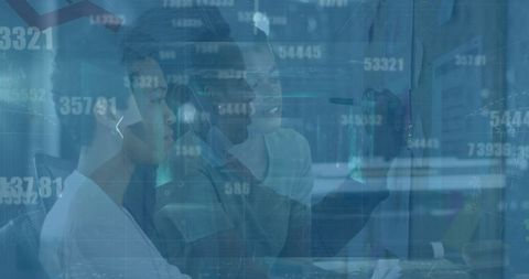 Diverse businesswomen analyzing financial data and technology charts