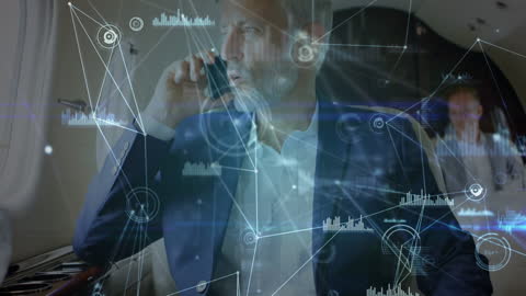 Businessman Communicating Amidst Digital Data Visualization