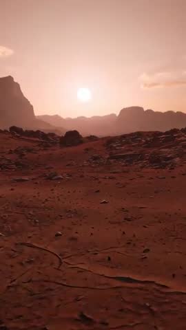 Gliding Vertical Video Over Cracked Red Desert Plain at Sunlit Horizon with Silhouetted Cliffs