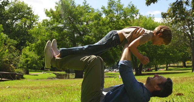 Father and Son Playing in Park on Sunny Day - Download Free Stock Images Pikwizard.com