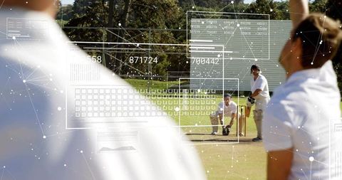 Cricket batter holding bat at crease with augmented reality HUD overlays and analytics