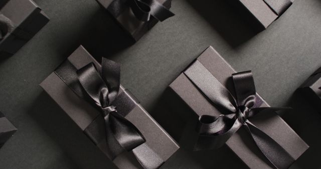 Elegant Black Gift Boxes with Satin Ribbons on Dark Background - Download Free Stock Photos Pikwizard.com