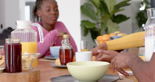 Family Eating Breakfast Together Around Dining Table - Download Free Stock Images Pikwizard.com