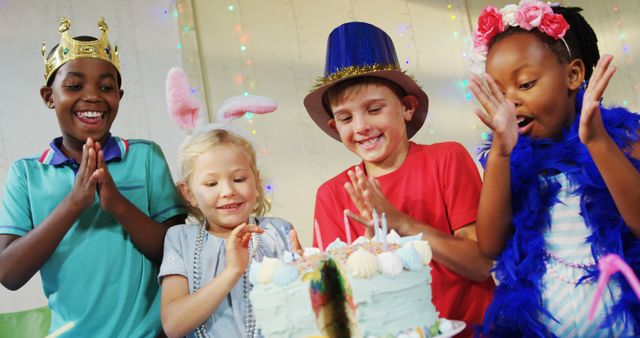 Children Joyfully Celebrating Birthday Party with Cake Candles - Download Free Stock Images Pikwizard.com